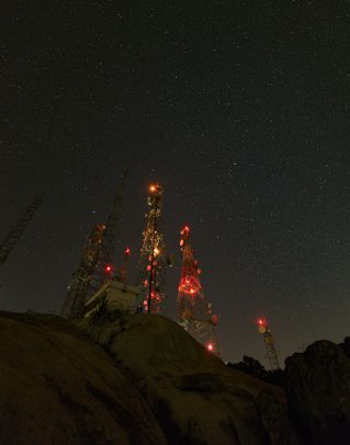 Low Angle Shot of Antennas during Night Time